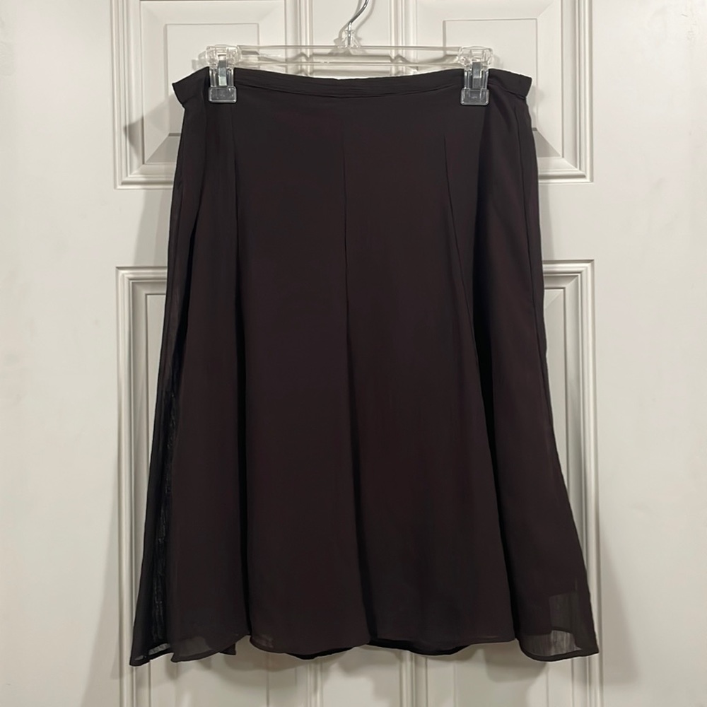 A-line knee length skirt in dark espresso brown. Elastic waist, UK size 10.